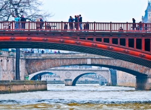 As we traveled down the river, we passed many bridges that any time you see movies filmed in Paris you will see these bridges  Photography by Willie Brown